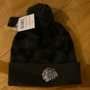 Blackhawks winter camo hat.